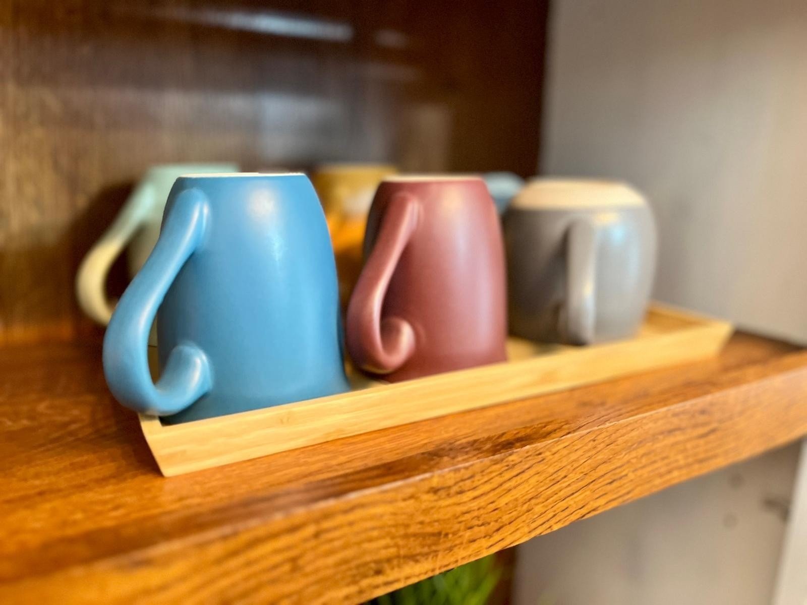 Detail — mugs and shelf