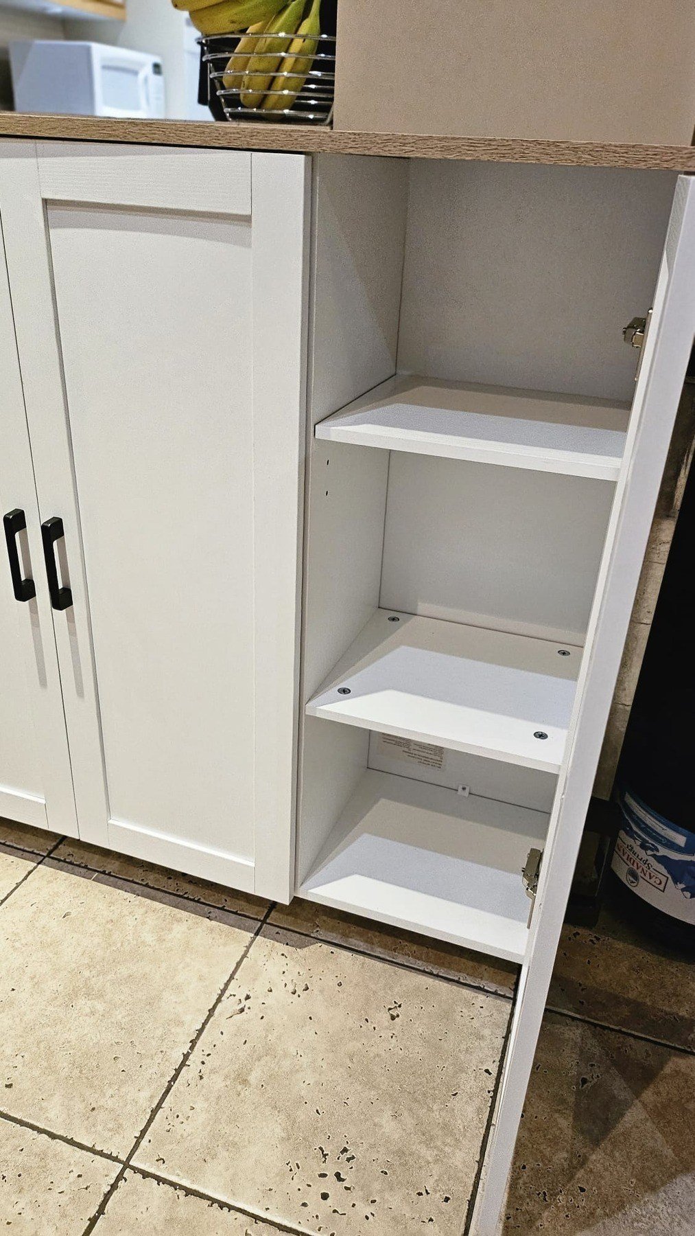 Kitchen Storage Cabinet Assembly — door fitting