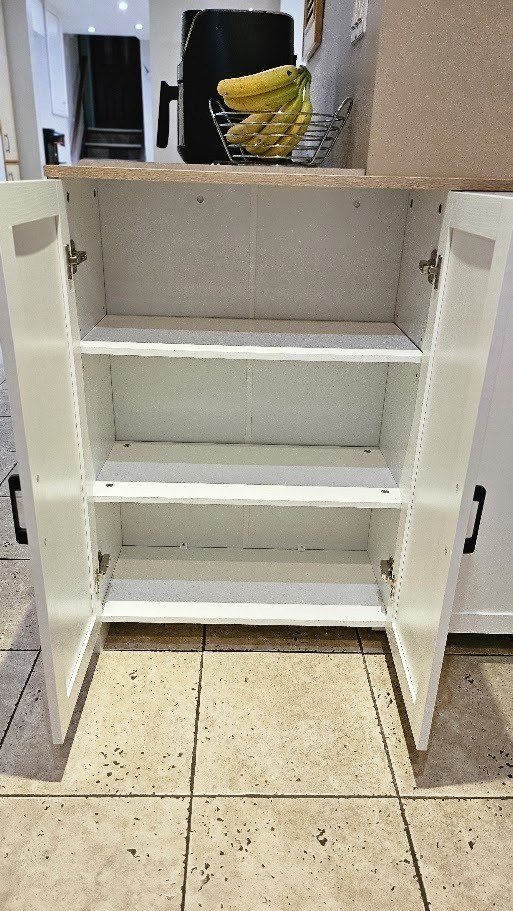Function — cabinet open with shelving visible
